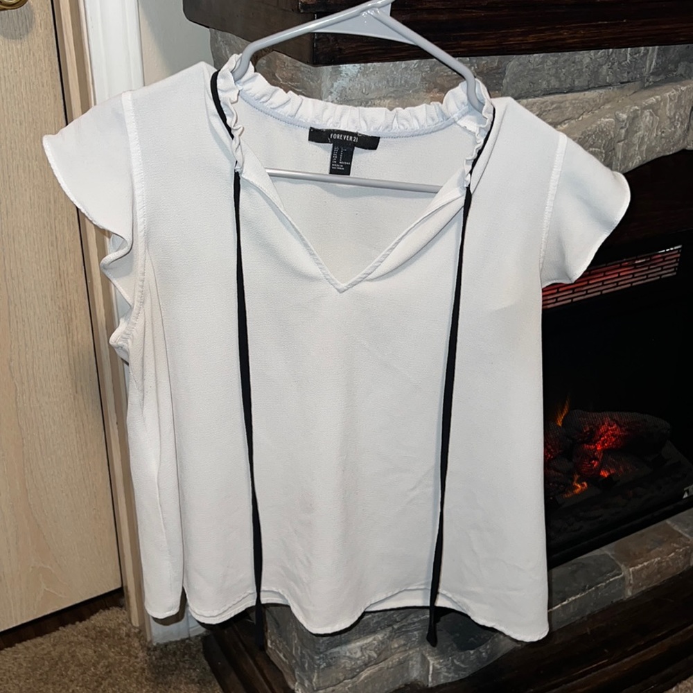 Forever 21, Small. White with black ties to be styled. Ruffle sleeves!